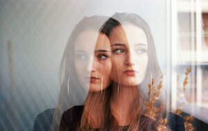 calgary depression hotline woman with inverted reflection scopio